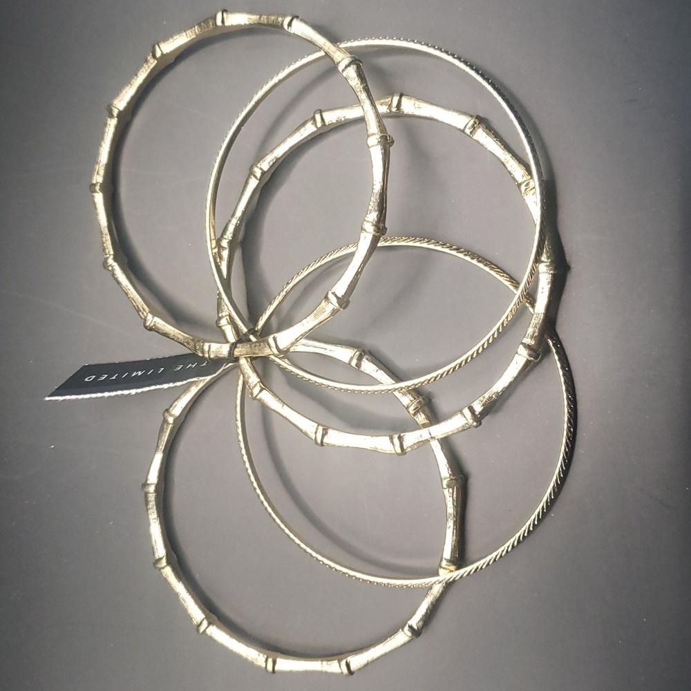 The Limited set of 5 goldtone stacking bracelets